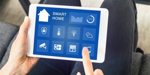 person-is-using-tablet-with-smart-home-it